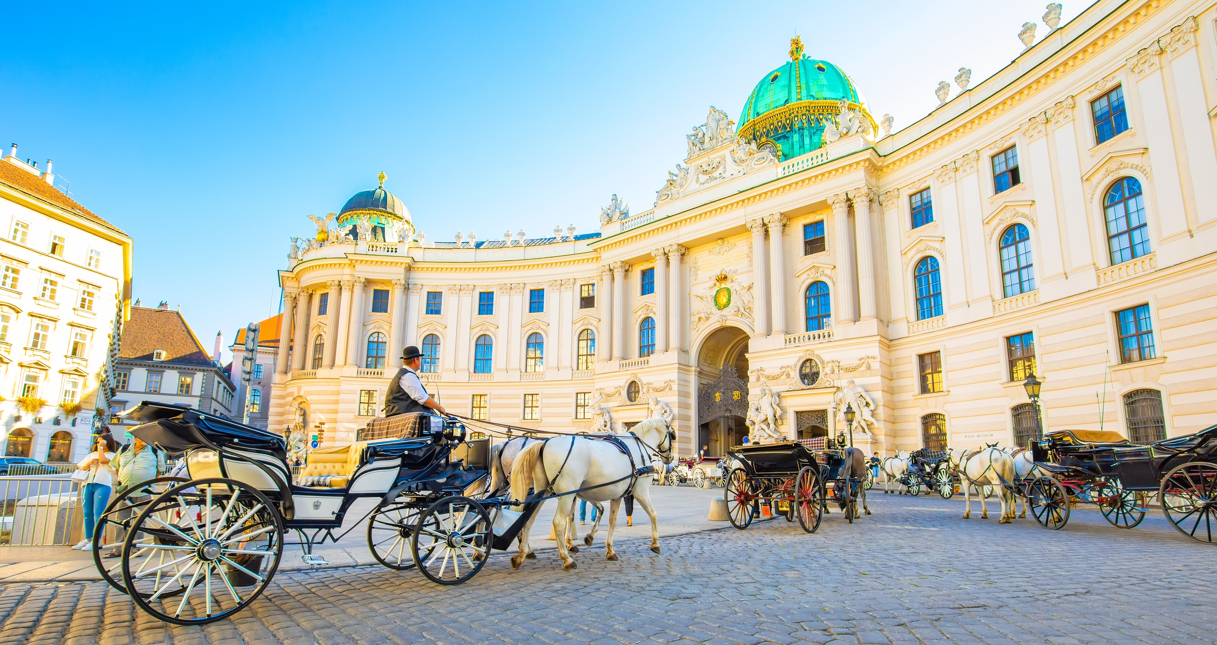 A horse-drawn carriage known as a Fiaker, commonly seen in Viennas first district.